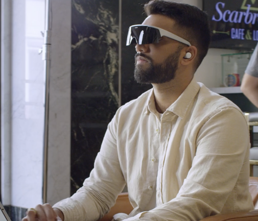 Man wearing VR headset in office